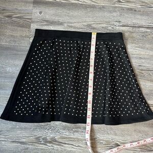 Gold studded flared mini skirt